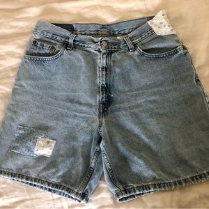 Custom vintage hand made Levi’s 550 denim patchwork shorts.